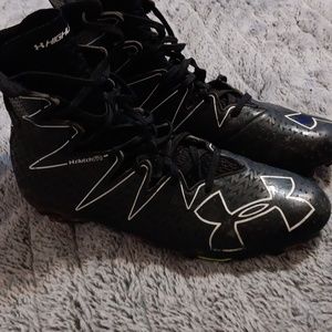 Some black and white addidas cleats